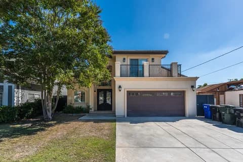 6522 N Golden West Ave — street elevation, driveway, and garage