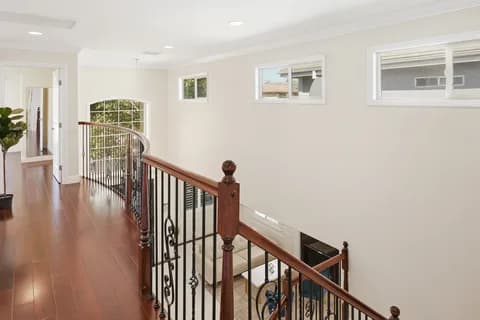 6522 N Golden West Ave — upstairs landing and stair rail