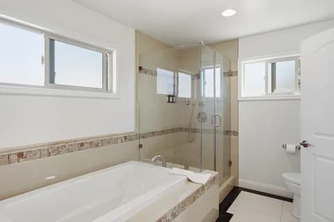 6522 N Golden West Ave — bathroom tub and shower