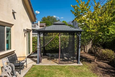 6522 N Golden West Ave — gazebo in the side yard