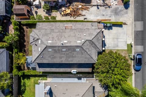 6522 N Golden West Ave — overhead of the roof, driveway, and the neighboring construction lot