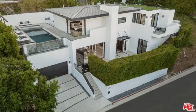 Hollywood Hills luxury contemporary with infinity pool and DTLA views, closed by Annie Liu Williams — photo 1